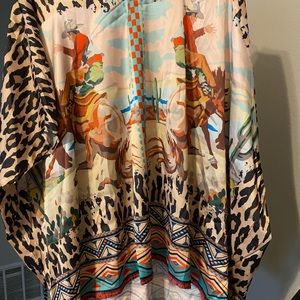 Satin poncho top.  Runs true to size. New with tags